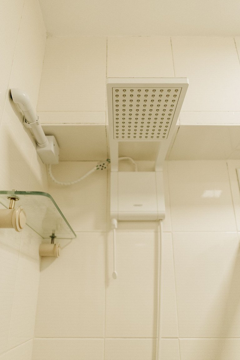 Apartamento familiar com acesso privativo à Praia Mansa