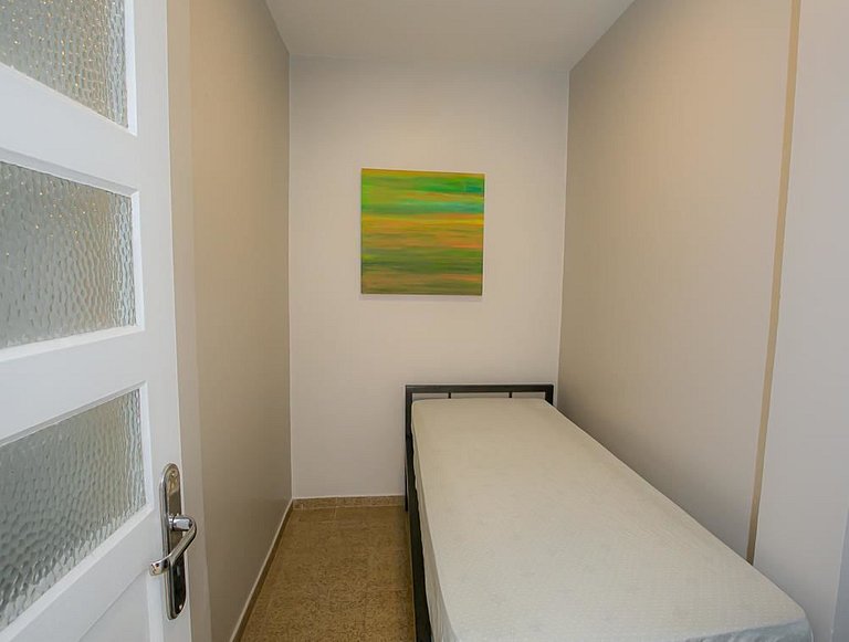 Apartamento familiar com acesso privativo à Praia Mansa